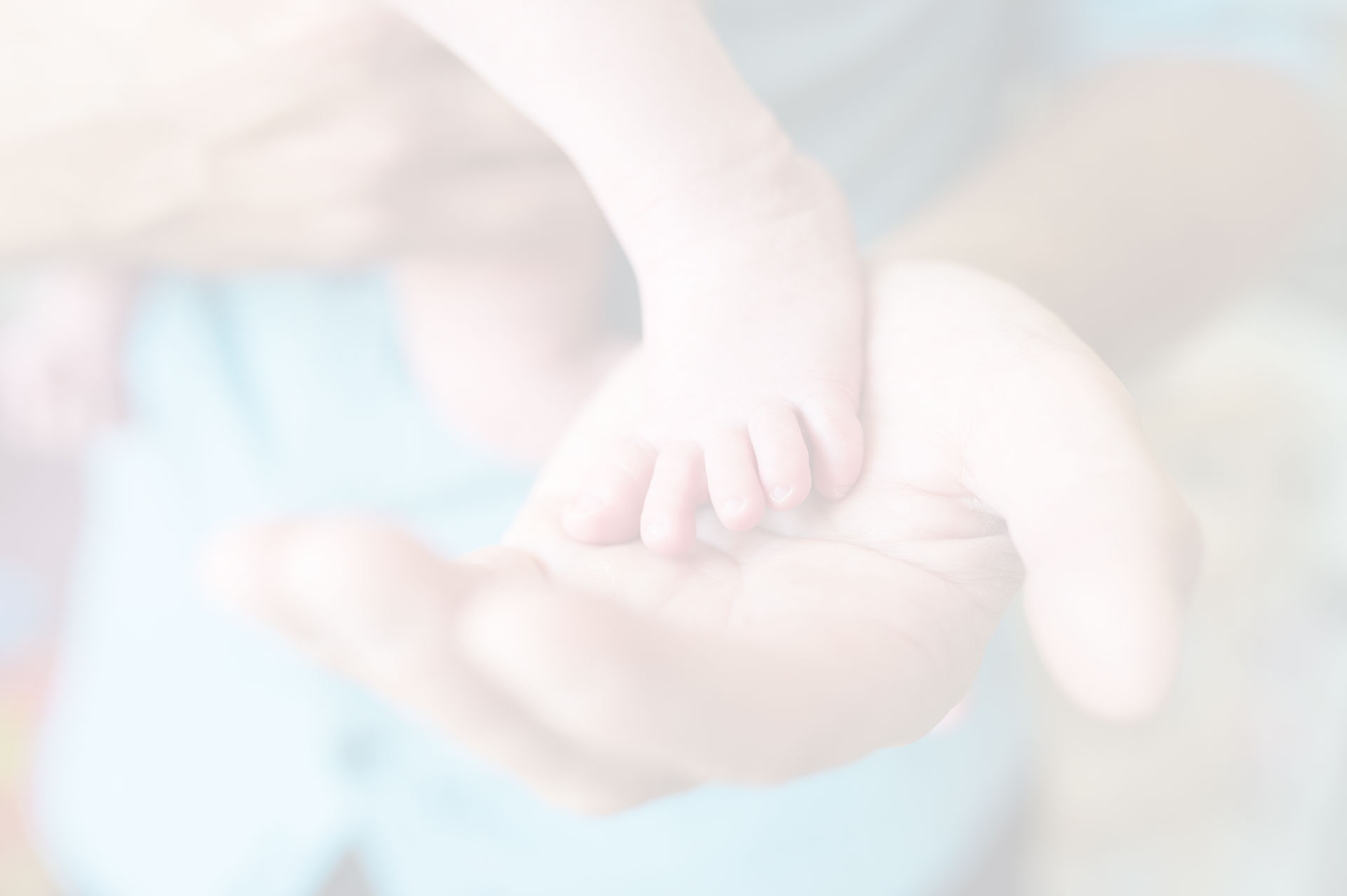unrecognizable-father-with-newborn-baby-son-leg